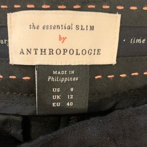 Anthropologie women’s black on black patterned pants